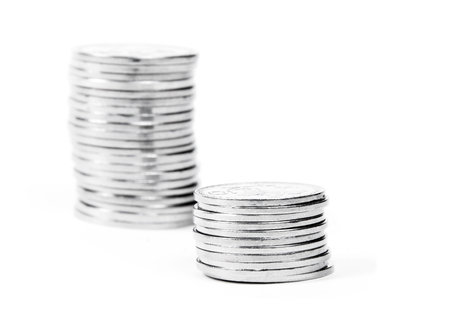 Coins on the white surface