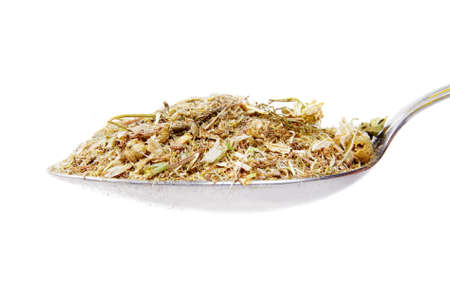 Dry chamomile flowers on metal spoonの写真素材