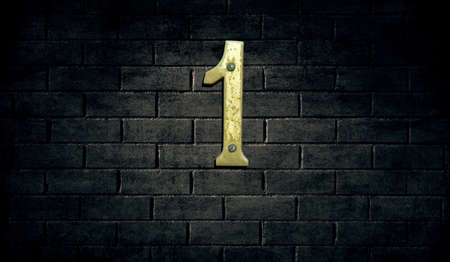 Old house number sign on wallの写真素材