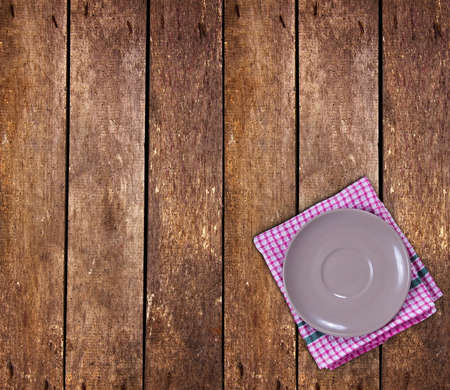 Plate with table cloth or towel on tableの写真素材