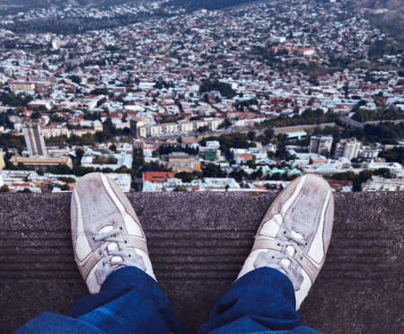 Man standing on the edgeの写真素材