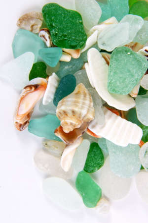 Sea finds. Sea glass and shells on whiteの写真素材