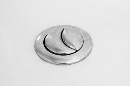 Toilet flushing buttons closeup