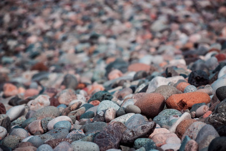 Sea stones in sunny day