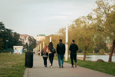 BATUMI, GEORGIA- April 14, 2018: People walking and having in Batumi park.