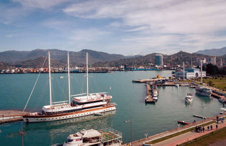 BATUMI, GEORGIA- April 1, 2018: People and ships in the Batumi port marinaのeditorial素材