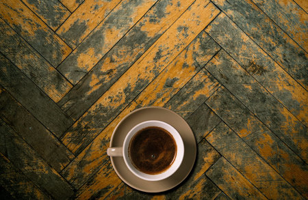 Cup of coffee on wooden table