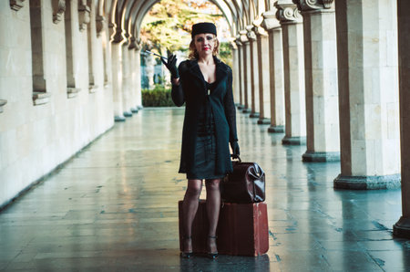 Retro woman on the train station