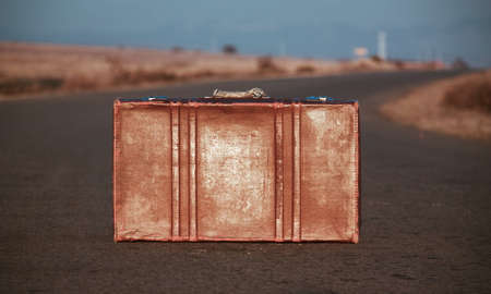 Vintage bag on the roadの写真素材