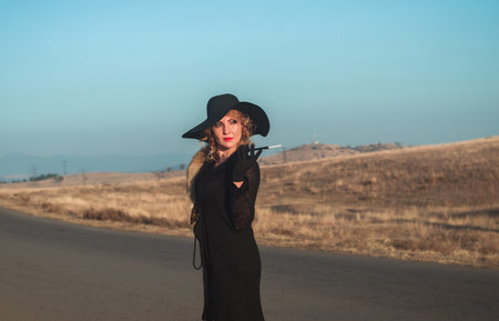 Retro beautiful blond woman portrait on road