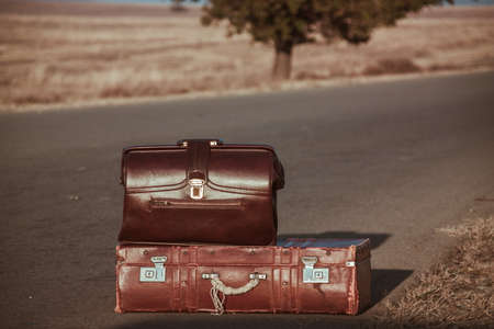 Vintage bag on the roadの写真素材