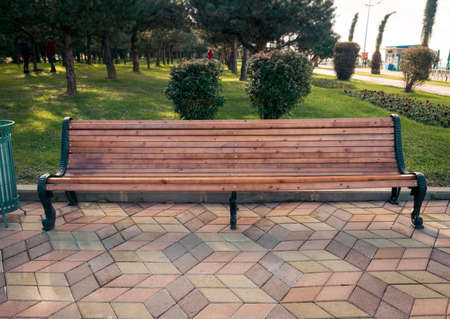 Closeup of the autumn bench in parkの写真素材