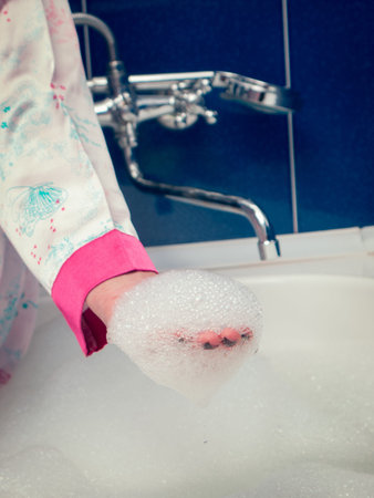 Casual girl preparing the bathroom