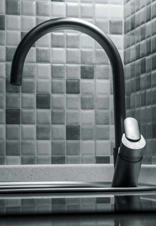 Modern tap closeup in kitchenの写真素材