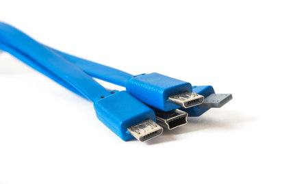 Various USB phone chargers on the white