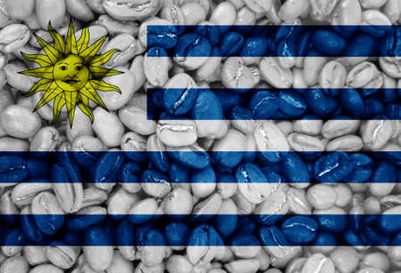 coffee beans with the Uruguay country flag backgroundの写真素材