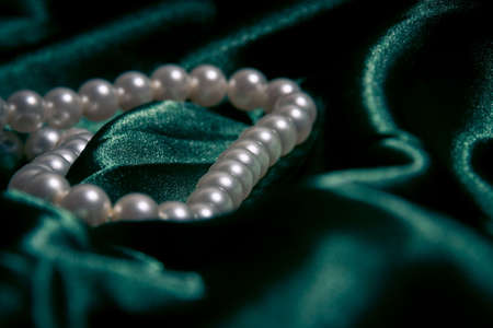 Pearls closeup on the silkの写真素材