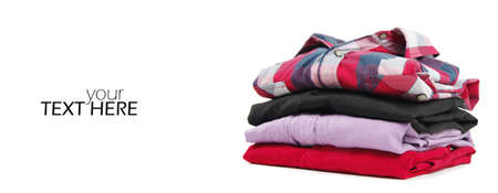 Stack of red shirts  on the whiteの写真素材