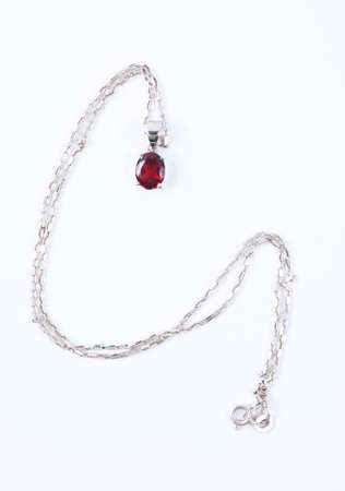 Necklace with the ruby stones on the whiteの写真素材