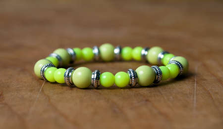 Bead bracelet on the wooden tableの写真素材