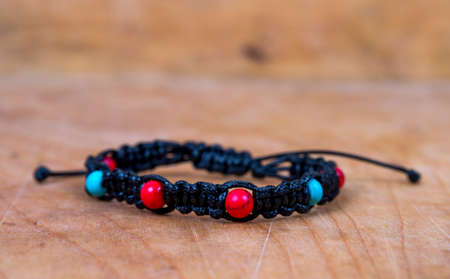 Bead bracelet on the wooden tableの写真素材