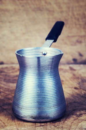 Coffee boiling pot on the tableの写真素材