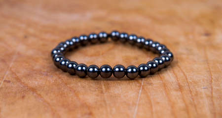 Bead bracelet on the wooden tableの写真素材