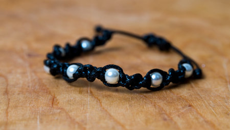 Bead bracelet on the wooden table