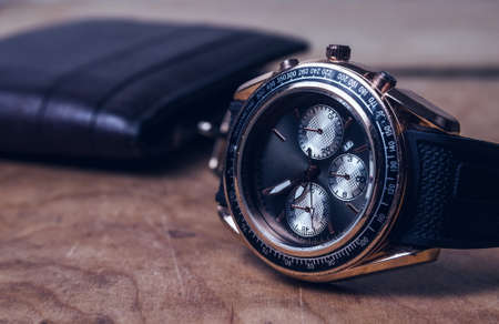 Business wristwatch on the wooden tableの写真素材