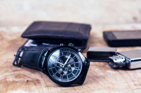 Business wristwatch on the wooden tableの写真素材