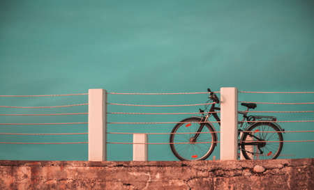 Bicycle in the pier in sunsetの写真素材