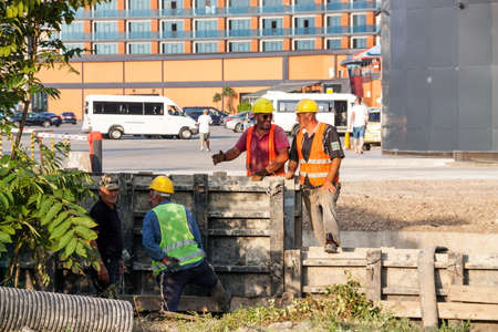 Batumi. Georgia - September 28, 2020: Workers on the building site in Batumi. Georgiaのeditorial素材