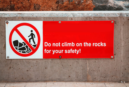 Do not climb on the rocks sign