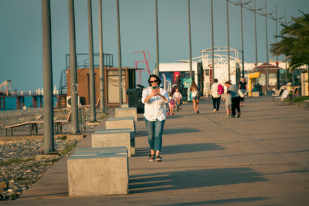 Batumi. Georgia - October 14, 2020: People on the  boulevard of Batumi resort. Georgia