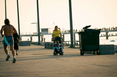 Batumi. Georgia - October 12, 2020: People on the  boulevard of Batumi resort. Georgiaのeditorial素材