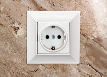 Eletricity outlet at home closeup
