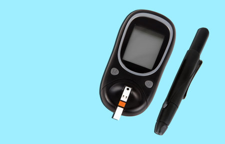 Sugar glucometer on the blueの写真素材