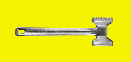 Kitchen hammer on the yellowの写真素材