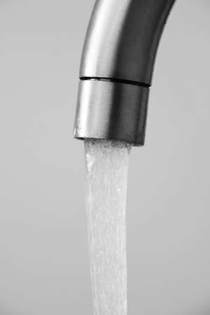 Flowing water from the home tapの写真素材