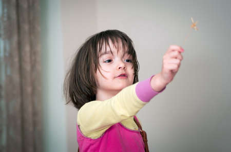 Little girl portrait at homeの写真素材