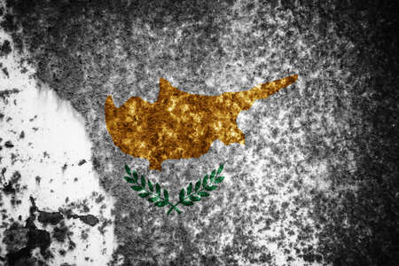 Old cracked wall with the flag paintedの写真素材