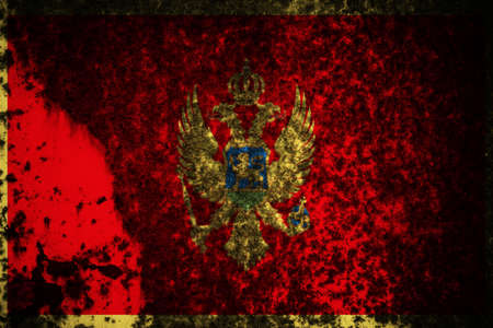 Old cracked wall with the flag paintedの写真素材