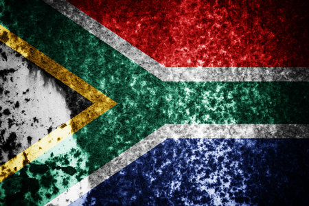 Old cracked wall with the flag paintedの写真素材