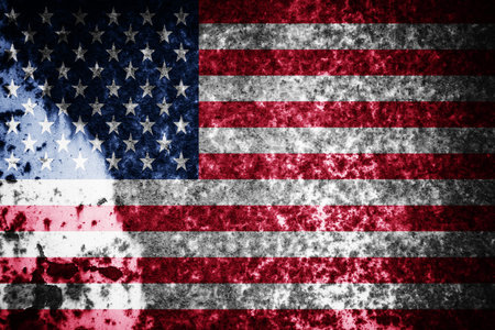 Old cracked wall with the flag paintedの写真素材