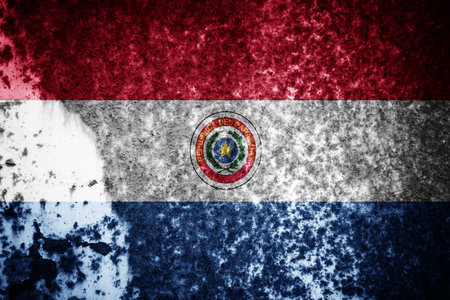 Old cracked wall with the flag paintedの写真素材