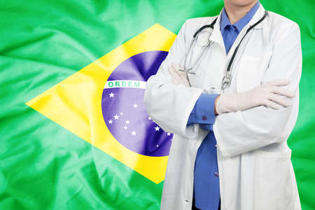 Doctor standing with the flagの写真素材