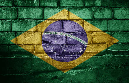 Dark brick wall with the flagの写真素材