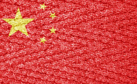 Flag on the knitted surfaceの写真素材