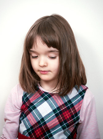 Little lovely girl portrait at home