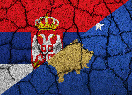 Textured flag of the Kosovo and Serbiaの写真素材
